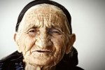 5372301-very-old-woman-face-covere-with-wrinkles-closeup-photo